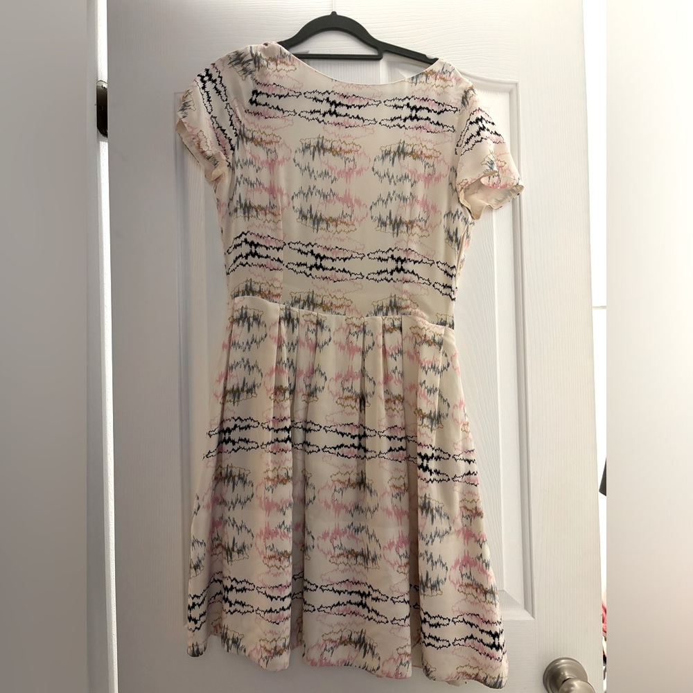 Lorick silk (gossip girl)size 6 dress.  Dress with pockets and open back.